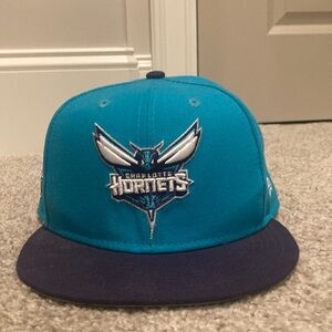 NWOT New Era ADJUSTABLE Charlotte Hornets lid.